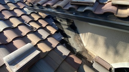Shingle roof fascia repair in Fort Myers, FL by Robertson Roofing experts.