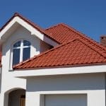 Modern home featuring a stylish tile roof installed by Robertson Roofing in Fort Myers, Florida.