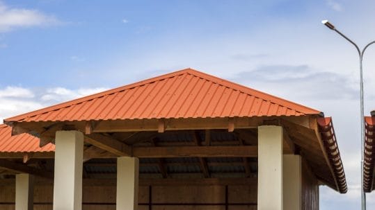 Metal roofing installation for hotels and hospitality businesses in Fort Myers by Robertson Roofing.