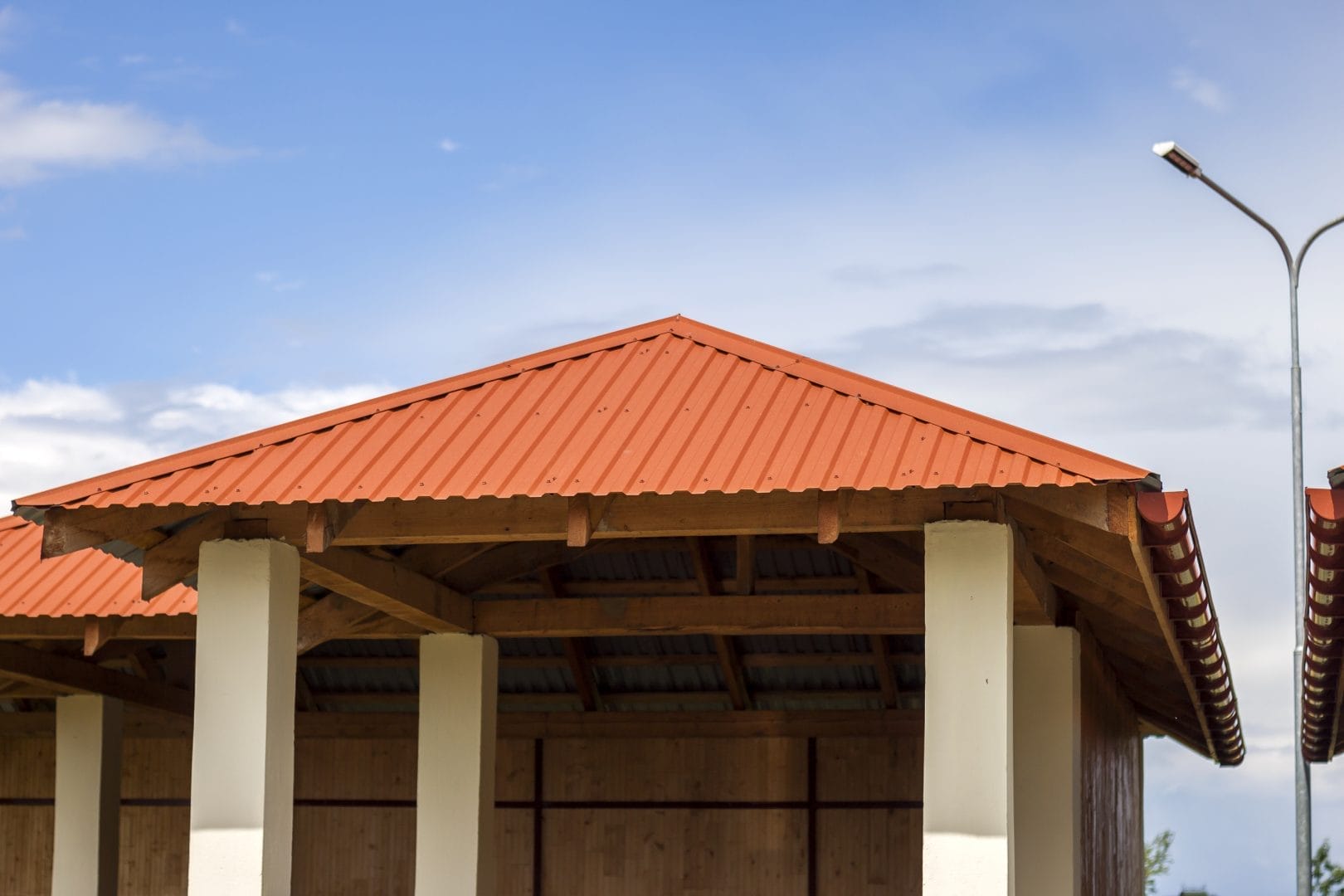 Metal roofing installation for hotels and hospitality businesses in Fort Myers by Robertson Roofing.