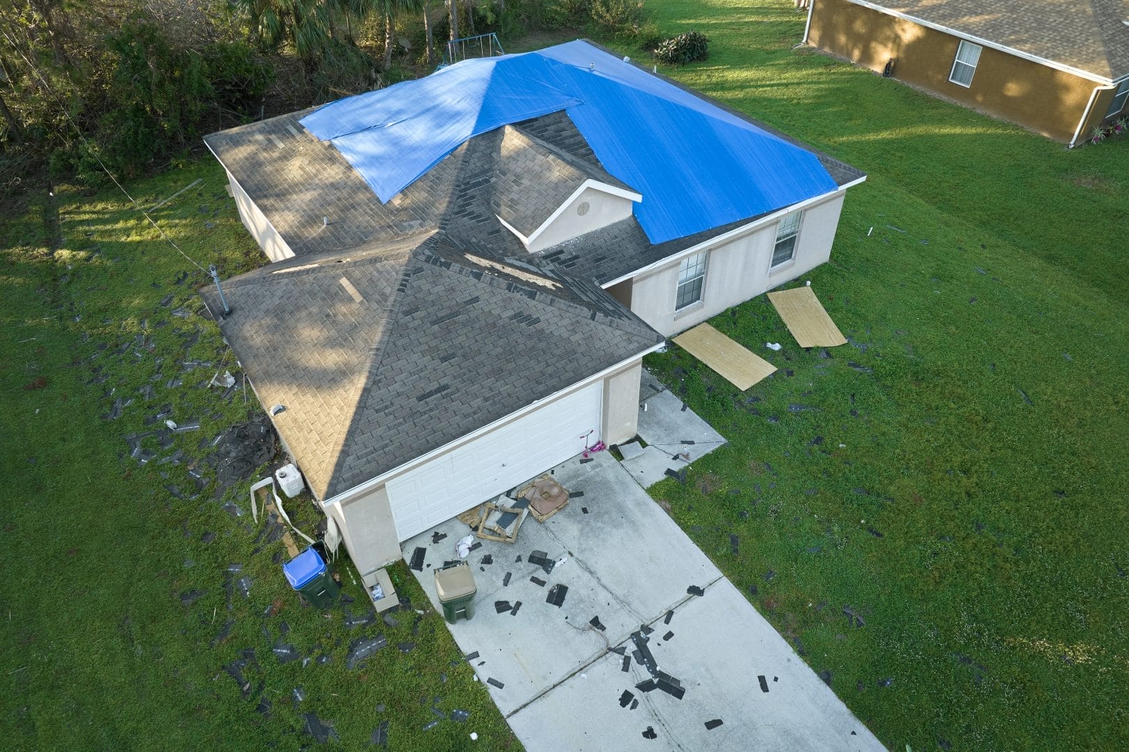 Sustainable roofing installation in Fort Myers using eco-friendly tile materials after storm damage replacement by Robertson Roofing.
